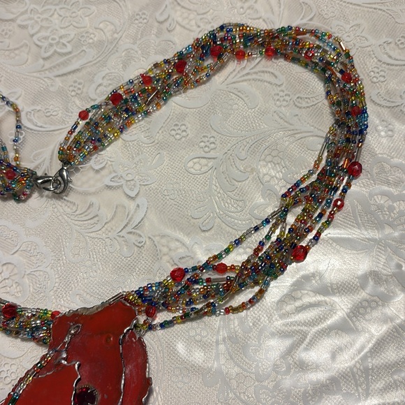 Handcrafted used multicolor Beaded Necklace w/lg. red metal hang dec. 8 strands - Picture 8 of 10